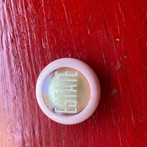 Estate “Dew me” baked highlight powder. Never used